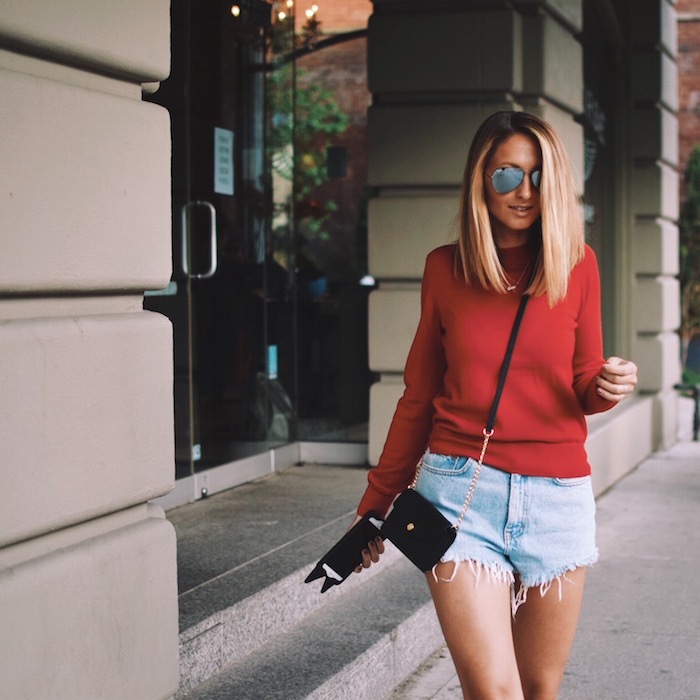 Red Sweater Rights – JUSTINE